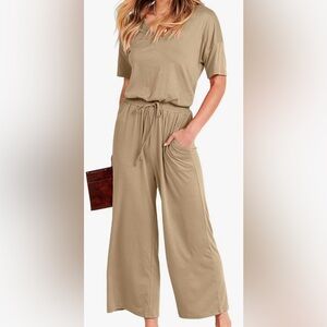 NEW with tags 
Pretty tan jumpsuit XL